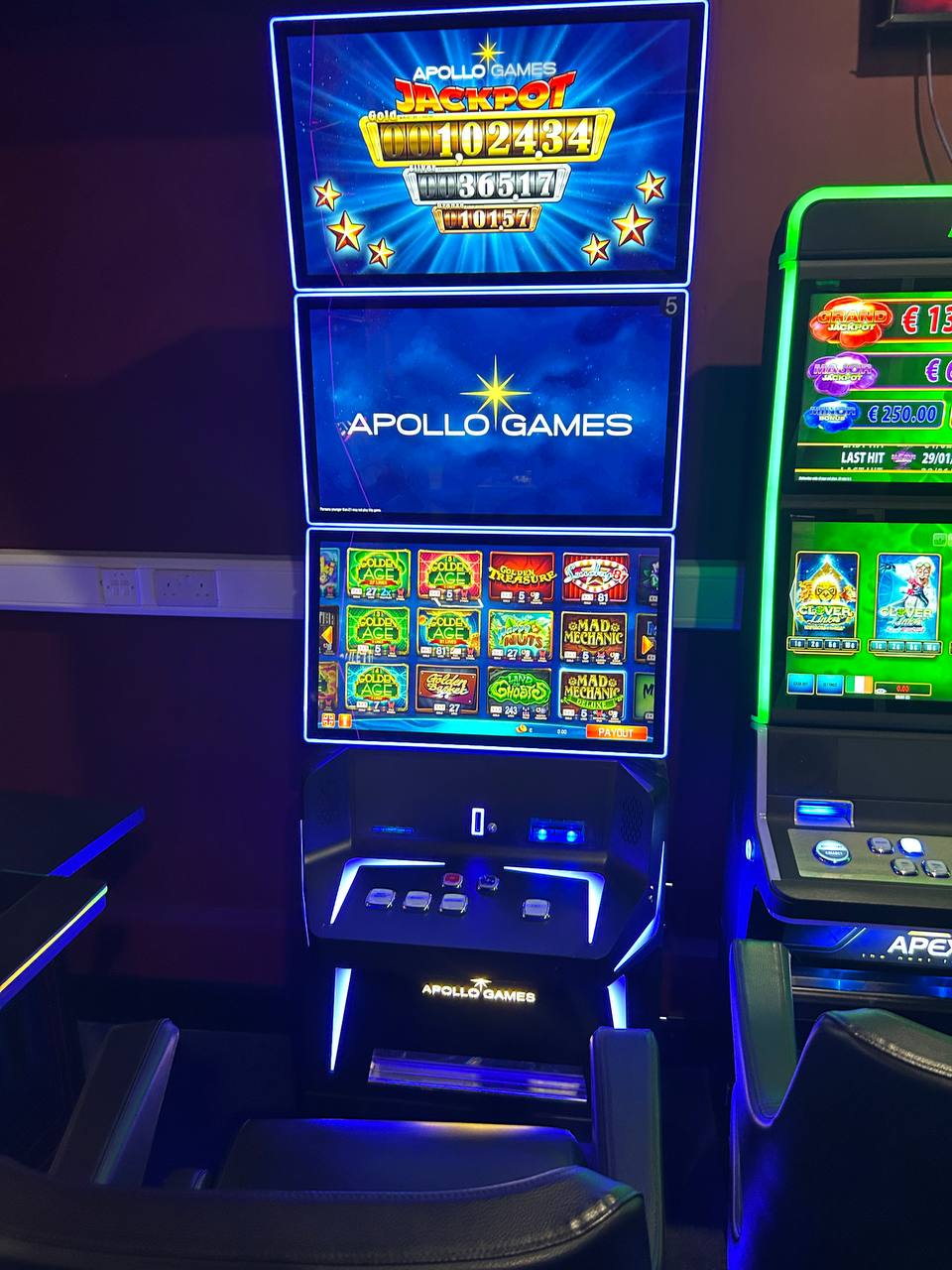 Apollo Games triple-screen jackpot machine showing Gold, Silver, and Bronze jackpots